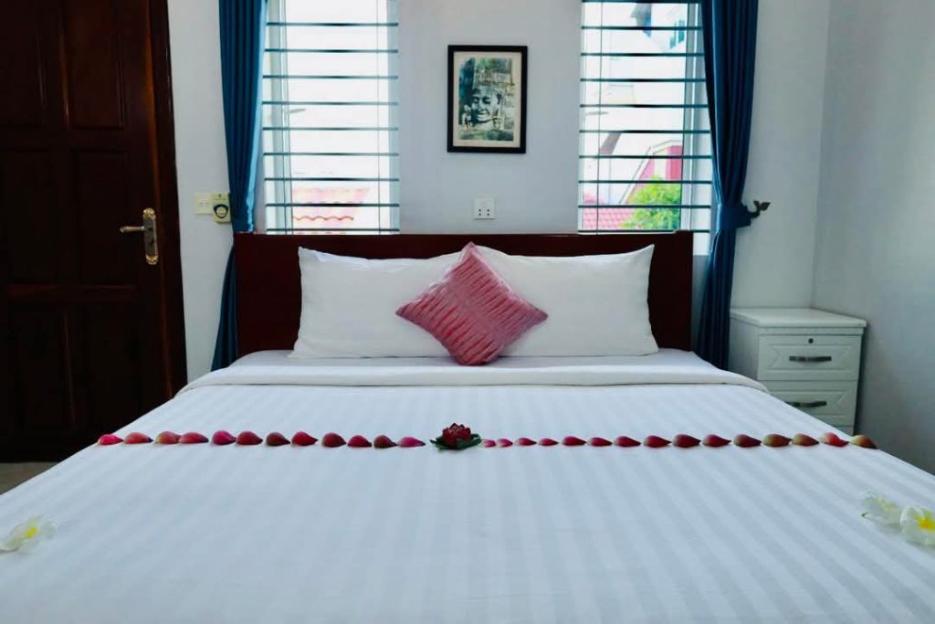 Cozy bedroom at our Siem Reap guesthouse, Carolina Angkor Villa